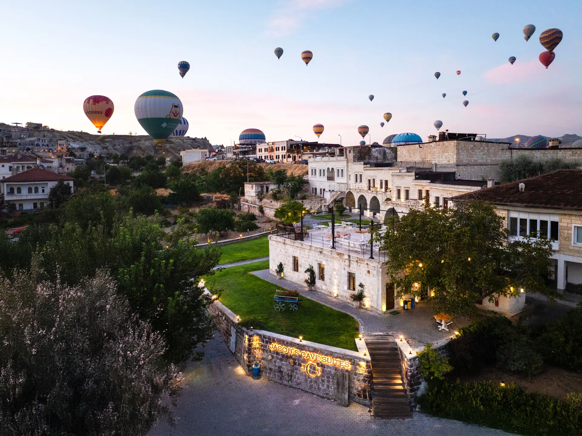 Aerial view of the hotel with hot air balloons