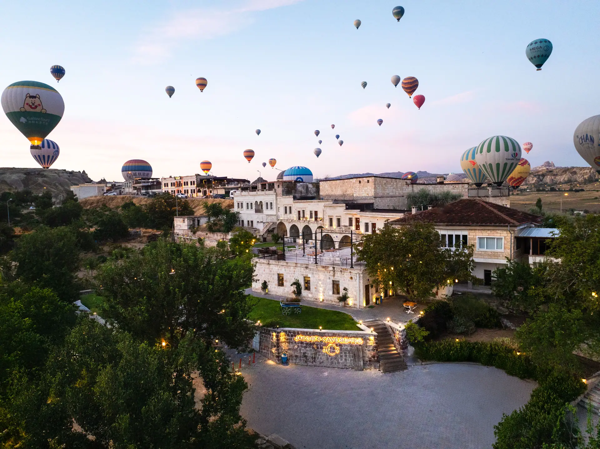 Aerial view of the hotel with hot air balloons