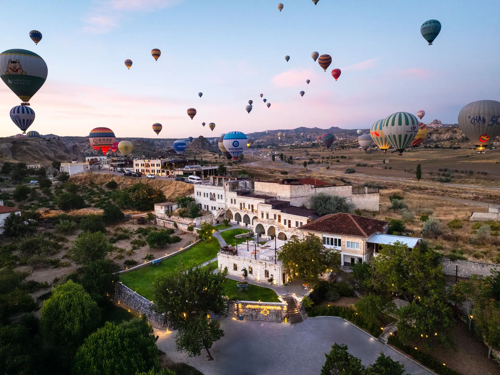 Aerial view of the hotel with hot air balloons