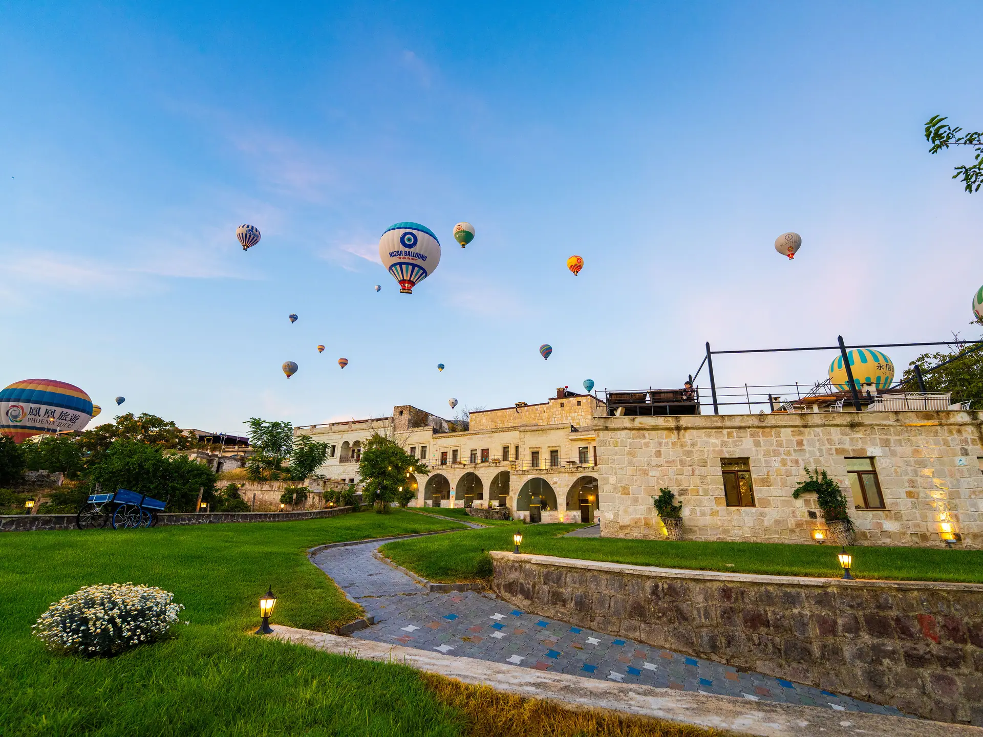 Hot air balloons over the hotel garden
