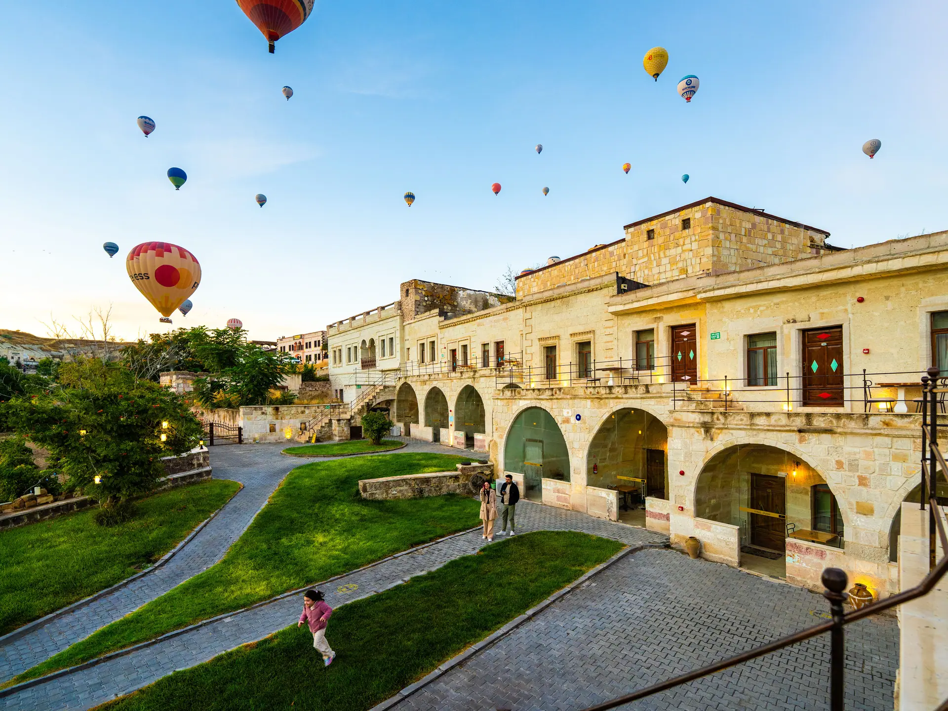 Hot air balloons over the hotel garden