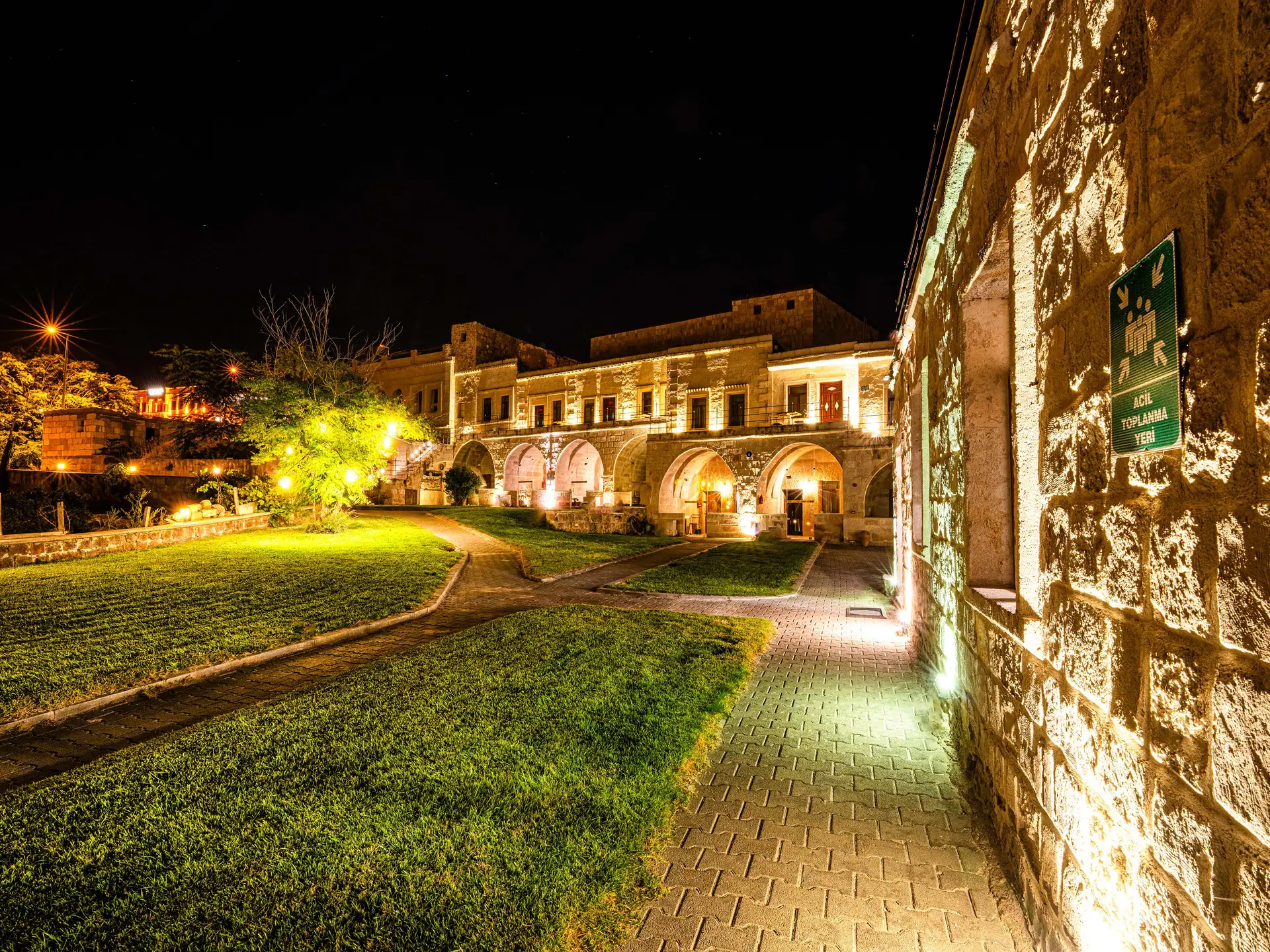The hotel lit at night