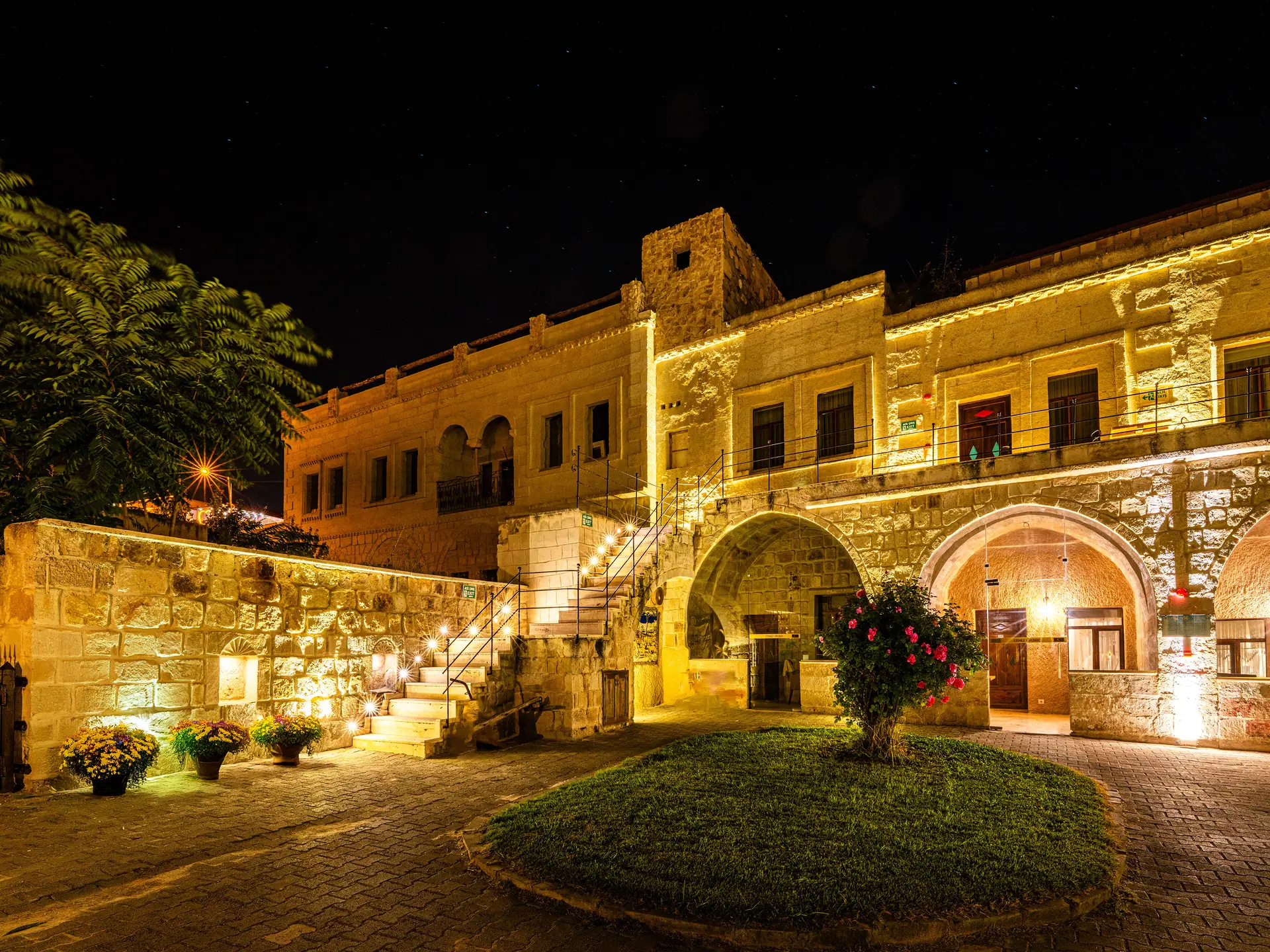 The hotel lit at night