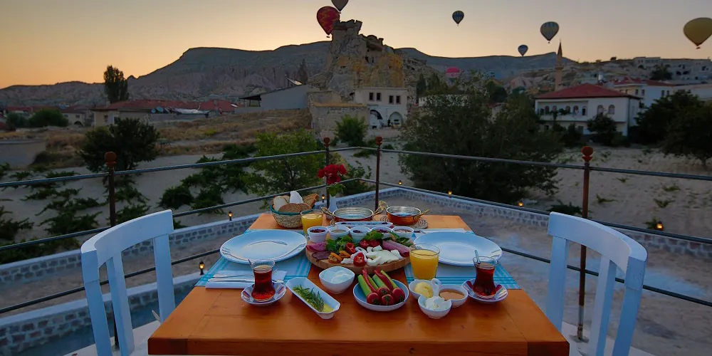 Terrace breakfast with balloon views